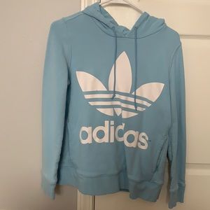 Blue adidas hoodie.